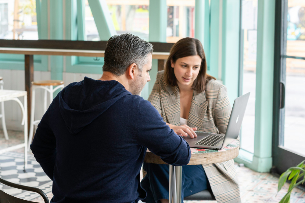 sales-meeting sales meeting discussing a sport game court installation